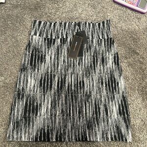 BCBG Maxazria bandage skirt in black and white size small